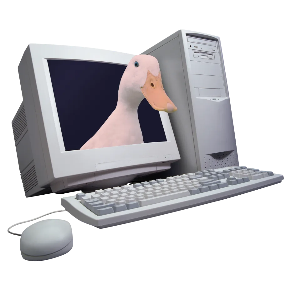 A curious duck peering out of the screen of a vintage desktop computer